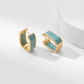 Macro view of gold rectangular huggie earrings with micro-pave turquoise blue zircon stones - Gold with Sky Blue Zirconia