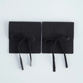 Two black microfiber suede jewelry pouches with silk ribbons and debossed logo detail - 9x9cm / Black