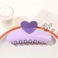 Detail view of a lavender heart-shaped hair claw clip on a white plate with aesthetic decor - Heart Semicircle / Light Purple
