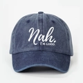 Detailed view of dark blue washed denim baseball cap with Nah. I'M GOOD. white text print - Navy Blue