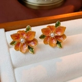 Floral stud earrings with orange petals, pearl center, and gold finish for women - Silver Earring Post Enamel Pearl Orange Flower Leaf Earrings
