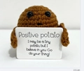Handmade knitted potato doll holding a white card with motivational English quotes - Mini Potato 4.5cm
