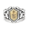 Close-up of vintage shield ring with golden cross relief and engraved lettering details - Adjustable Open / Shield