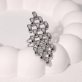 Detail shot of the woven chain texture on a silver stainless steel geometric open ring - Woven Chain Design (JR573-Steel Color)