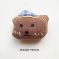 Close-up of brown plush bear accessory with blue plaid bow, size 4.5cm by 5cm - Coffee Bear with Plaid Hat