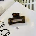 Top view of medium square cutout hair claw clip in tortoise brown resin finish - Matte Light Tortoise