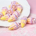 Close-up of colorful acrylic ice cream beads for DIY jewelry and phone charms on lace - 1 Piece / Pointed Bottom + Yellow Cone + Frosted Pink Bead + Pink Purple Cream