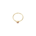 Detail view of a minimalist gold band ring featuring a pink round-cut birthstone bezel setting - US Size 7 / Gold-Light Purple (Jun)
