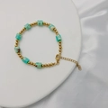 Detalle de cuentas de piedra natural y cadena de acero de titanio dorado con cierre de langosta - Piedra Cian 17+5cm