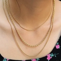Triple layer golden snake and rope chain necklace set shown on a female model - Style 4-18 (Gold 3-Layer: Double Snake+Rope)