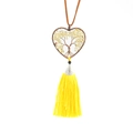 Macro detail of hand-woven tree of life heart pendant with yellow stones and fringe - Yellow Stone