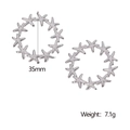 Detailansicht der 35mm Seestern-Ohrringe aus silbernem Stahl mit 7,1g Gewichtsangabe - Stahlfarbe