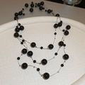Close-up of double-layered long necklace featuring black beads and silver metal chains - 13# Necklace-Silver-Black