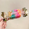 Close-up of colorful high-elastic hair ties set in a cute candy-shaped plastic case - Colorful 1