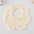 Soft 100% cotton petal baby bib in cream with colorful polka dots and snap closure - Gauze Flower Bandage - Colorful Polka Dots