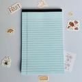 Light blue legal pad with black horizontal lines and top binding for office use - A5 / Blue