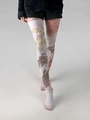 Detail shot of sheer patterned tights with abstract geometric tie-dye print on legs - 1825 Blocky Graffiti
