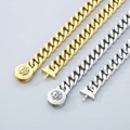 Detail of 11mm Cuban link chains in gold and silver with skull clasp design - Bracelet 21cm / Steel Color/Skull Buckle