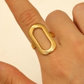 Irregular golden stainless steel ring with textured oval hollow design on model - Oval Hollow Design (WG-0945) / Gold