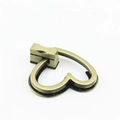 Chiusura girevole a cuore in bronzo per borse e accessori in pelle e pelletteria - Finiture ottone antico