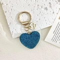 Sparkling blue crystal heart keychain with golden ring and premium metal charm - Teal