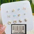 Fresh 12-piece stud earring set with bow, pearl, and floral designs in cream white - CRX4 Beige Series / 6 Pairs Set