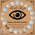 Pink Zebra Jasper Evil Eye beaded bracelet in sky blue texture with gold hollow tube charm - Snakeskin Stone