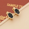Detail of Hamsa Hand hoop earring in gold finish with black enamel dripping oil detail - Hamsa Hand