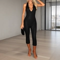 Sexy black halter neck deep V jumpsuit with textured slim fit design for women - S / Black