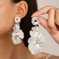Detailed view of silver layered petal earrings with irregular pleated metallic texture - Three-Layer Irregular Petal Silver (10233)