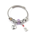 Detail of silver cable bangle with purple crystal beads, heart lock and lipstick charm - Lipstick Heart Lock (C1-017) / Purple