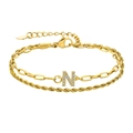 Bracelet double couche doré avec chaîne torsadée, trombone et pendentif lettre N en zircone - Lettre N