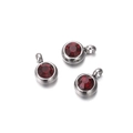 Detailed close-up of three dark red faceted zircon charms set in silver metal bases - 10 Pieces per Pack / Steel Border Wine Red Stone