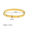 Macro view of gold plated titanium steel bangle with five crystals and 5.9cm inner diameter - Wide Surface Round Zirconia Style (HF-B5181-G)