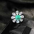 Flower shaped ring with square emerald center and teardrop zircons on black fabric - Paraiba Green Ring 【Adjustable】