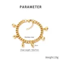Detailed macro view of 18K gold plated stainless steel bracelet with tiny bell charms - Gold (KB210088-Z)