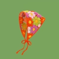 Handmade crochet daisy headscarf in pink and orange floral pattern with orange ties - Colorful 3D Patchwork Floral