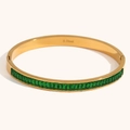 Golden stainless steel bangle with green emerald square gems in a luxury finish - Half Row Green Zirconia Clasp Bangle - Gold