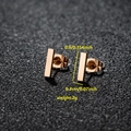 Minimalist rectangular bar earrings in rose gold finish on black textured background - 047 Bar Rose Gold