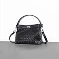 Classic black woven crossbody bag with top handle and silver metal turn lock closure - Black
