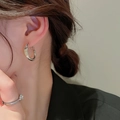 Detail shot of silver geometric earrings and sparkling rhinestone ring on model - Silver Hoop (13#)