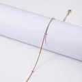 Thin gold-plated stainless steel chain necklace with small decorative beads on white stand - 45+5cm / 1.2mm Round Snake Beaded Chain / Gold