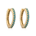 Detailed macro view of gold huggie earrings with sky blue turquoise inlay on white base - Gold Plated with Turquoise Zirconia