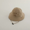 Close-up of khaki quick-dry sun hat with lucky smile embroidery and adjustable chin strap - Closed Eyes Smiley / Khaki