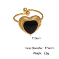 Detailed view of gold heart ring with black inlay and precise measurement specifications - Black