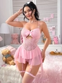 Detailweergave van de roze kanten bodysuit met tule rok en satijnen strikaccenten - S / Roze