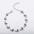 Bohemian style 14K gold cherry charm bracelet with red crystals and green enamel detail - Steel Red