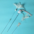 Three-piece cat teaser wand set with colorful feathers, pompoms and butterfly bows - 3-Piece Cat Teaser Wand Set Blue