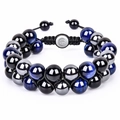 Detailed macro view of 10mm lava stone beads and magnetic hematite in hand-woven bracelet - Sky Blue Tiger Eye Bracelet