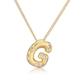 Collana placcata oro con ciondolo lettera G e zirconi scintillanti su fondo bianco - Lettera G